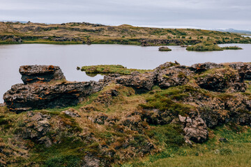 Volcanic rock formations in Lake Myvatn in Northern Iceland in summer