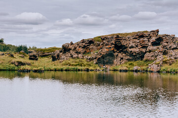 Volcanic rock formations in Lake Myvatn in Northern Iceland in summer
