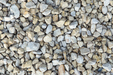 Gravel texture. White grey small rubble stones abstract background