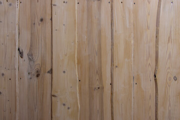 Fototapeta na wymiar Wooden background, texture of uneven boards.