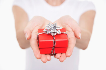 Hands With Small Wrapped Gift