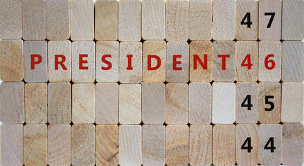 Time for a 46th President. Wooden blocks with the inscription 'President 46'. 44, 45, 47 numbers. Beautiful wooden background, copy space. Concept.
