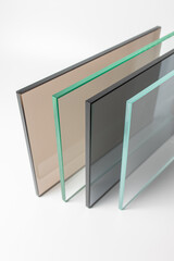 Sheets of Factory manufacturing tempered clear float glass panels cut to size - 395559119