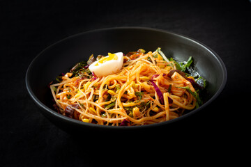 Korean food, JJolmyeon which is mixed with cold chewy noodles with vegetables and spicy sauce