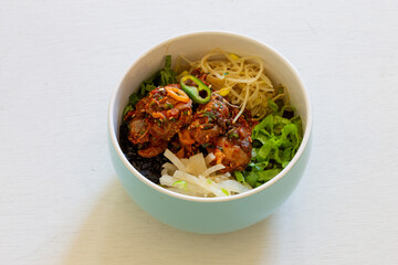 Korean food, Kkomag Bibimbab which is mixed with rice, vegetables and blood cockle