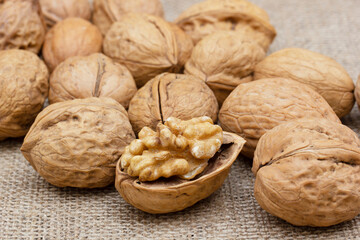 Fresh walnuts on burlap. Healthy food.