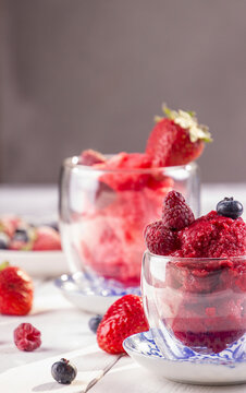 Berries sorbet in glasses (strawberry, raspberry, blueberry)