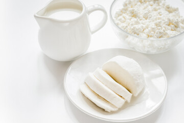 proteic breakfast concept with dairy products on table