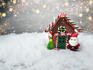 christmas decor on snow with garland lights