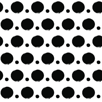 Vector polka dots seamless pattern, hand drawn black watercolor stains. Ink doted background, isolated on white.