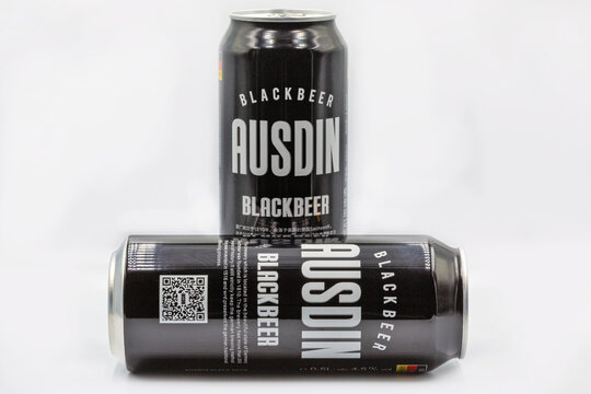 Ausdin by Privatbrauerei Eibau black beer cans closeup against white