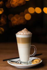 Latte coffee and whipped milk on top 