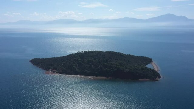 Drone video. An island near Greece in the Gulf of Corinth.