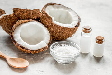 cosmetic concept with fresh coconuts on white table background