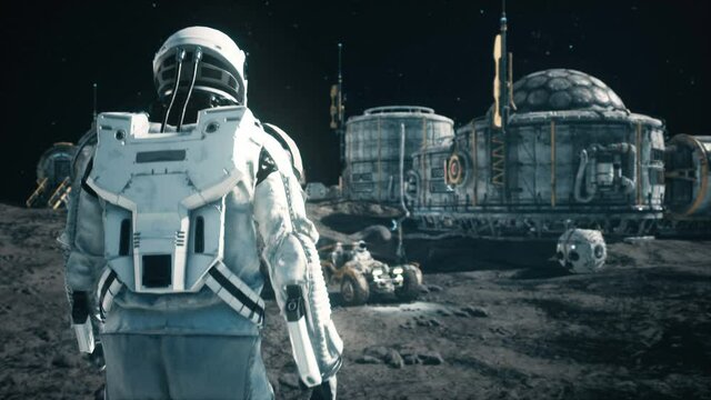 An astronaut approaches his rover at the space base of the future. Animation for fantasy, futuristic or space travel.