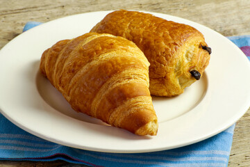 fresh croissants on a table