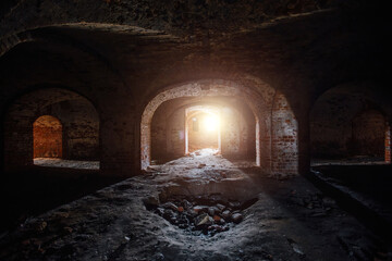 Dark and creepy vaulted red brick dungeon