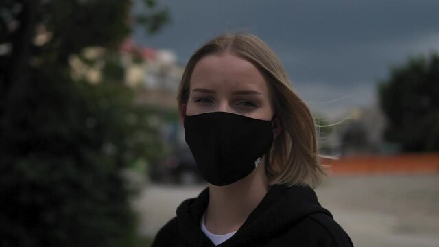 Portrait of Young Woman With Face Mask, Slow Motion