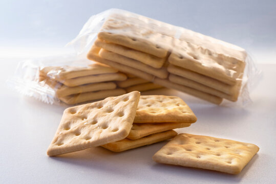 Gluten-free crackers packages ad crackers on a white background