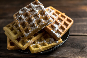 Homemade Belgium wafers with topping and sugar filling