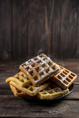Homemade Belgium wafers with topping and sugar filling