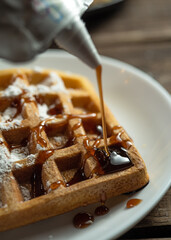 Homemade Belgium wafers with topping and sugar filling
