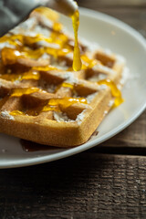 Homemade Belgium wafers with topping and sugar filling