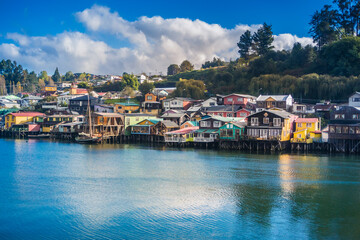 Fototapeta na wymiar Traditional houses on stilts in Castro, on the island of Chiloe, Chile.