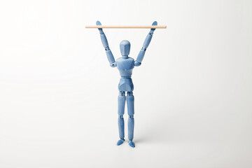 Gliederfigur mit Gymnastikstab