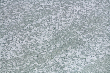 Aerial, helicopter view of the stunning arctic ocean in Hudson Bay, northern Canada, Manitoba. Taken in late fall before the sea ice fully freezes in the arctic ocean, taken in Churchill. 