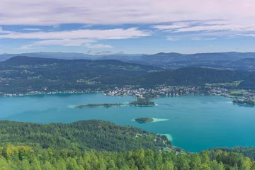 Foto op Canvas Aerial view with the alpine lake Worthersee from The Pyramidenkogel, the highest wooden viewing tower in the world, famous tourists attraction in Carinthia region, Austria © Aron M  - Austria