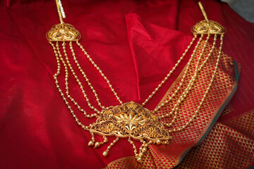 red and gold necklace