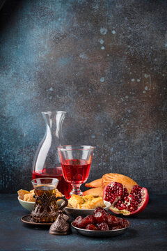 Ramadan Kareem Iftar Meal With Dates, Baklava, Traditional Arabic Sweets, Fruit, Arab Tea And Rose Sherbet Beverage