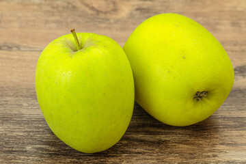 Two ripe green sweet apples