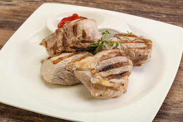 Grilled pork tenderlion with tomato sauce
