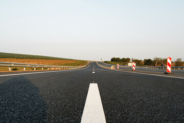 Fototapeta na wymiar White marking line on asphalt road on highway
