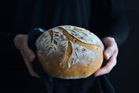 A loaf of bread in your hands