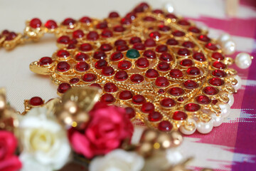 close up of gold pendent