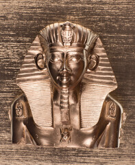 golden statue of the Sphinx isolated on golden background