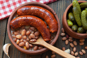 Tavche gravche traditional Macedonian dish. Baked beans with sausage