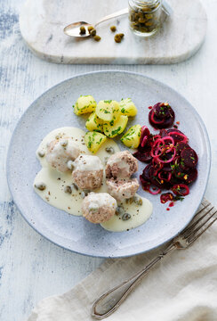 K�nigsberger Klopse (meatballs in a white sauce with capers) with salted potatoes and a beetroot salad