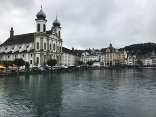 Fototapeta na wymiar view of Jesuit Church near the river Reuss in the old town of Lucerne, Switzerland