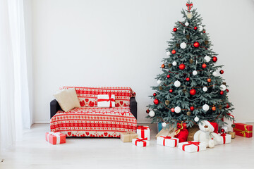 Beautiful decorated room with Christmas tree with presents under it