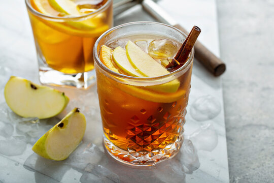 Apple cider old fashioned cocktail with cinnamon