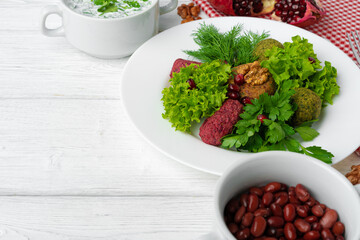 Traditional Georgian dish appetizer Phali served with salad leaves