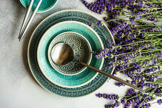 Summer time table set with minimalistic stoneware and cutlery