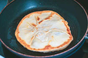 Fried Pie In A Pan With Butter Close-Up