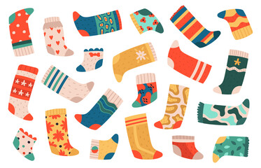 Kids socks. Cute colorful cotton socks, textile dotted and striped trendy clothes, wool comfort kids wear vector illustration set. Clothing with bright design, hearts, flowers, leaves