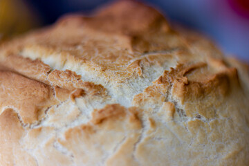 Close-up of Homemade Rustic Bread, comforting and crunchy made in the oven. Bread is a delicious and healthy food.