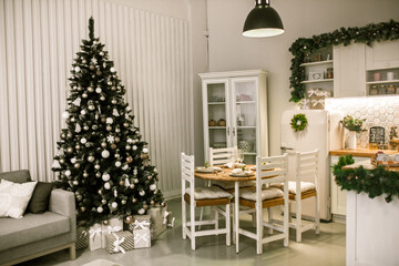 Interior light kitchen christmas decor. Decorated new Year fir